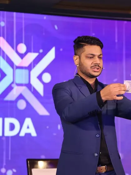 Performing a classic illusion with a modern twist at the World's NRI Meeting 2025. My acts are designed to be visually engaging and universally astounding.