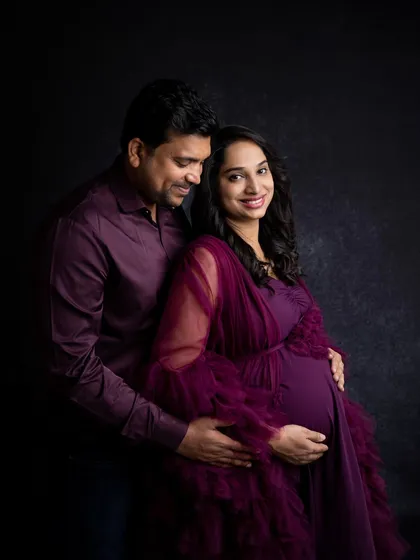 A happy and relaxed couple's pose. The way they look at each other shows their strong connection and excitement for the journey ahead.