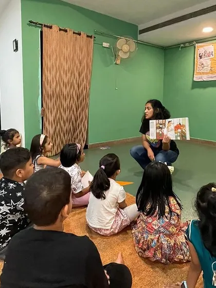 A series of photos from an indoor storytelling session for Pratham Books' 'One Day, One Story' event. This shows my journey as a storyteller, from park sessions to collaborations, and my passion for spreading the joy of reading.