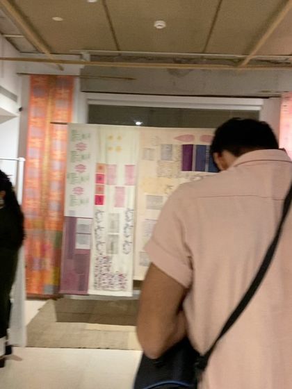 Glimpses from our "We Together Work" exhibition, where hand-printed textiles hang like art. These panels, created with the Bábbarra Women's Centre, tell ancestral stories through the medium of fabric.