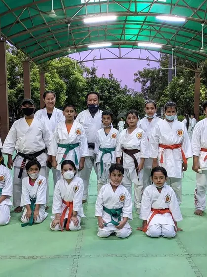 My classes are for everyone. Here is a group of my students, from young children to adults, with different belt levels, all training together at the Noida Stadium. Karate is a journey for the whole family.