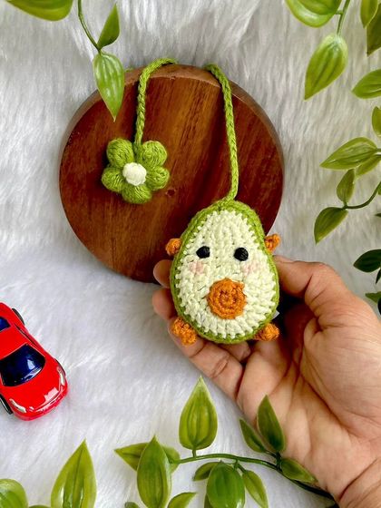 The avocado charm, ready to hang.