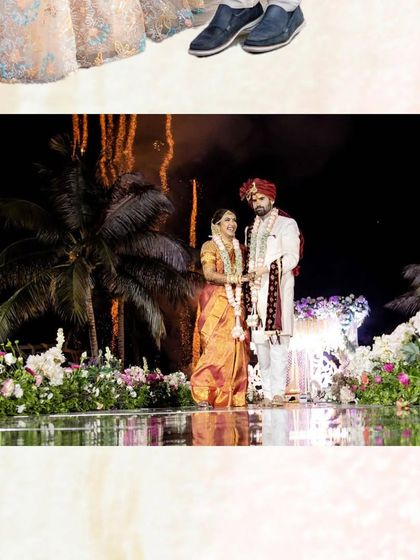 A stunning Varmala ceremony set against a tropical backdrop. We specialize in destination weddings, creating magical moments like this one on a stage over a pool with dramatic lighting.