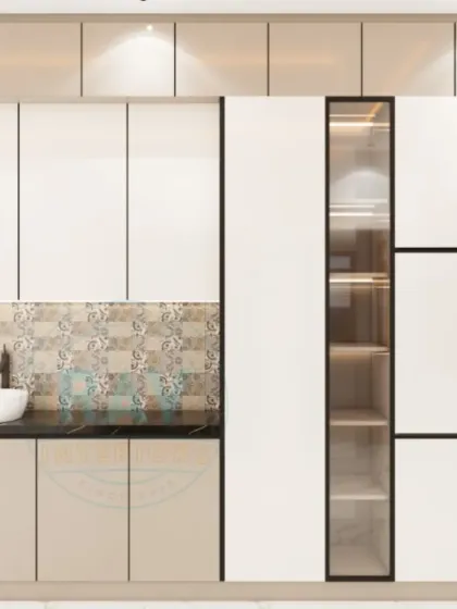 This crockery unit features a mix of white cabinets and glass-fronted displays, with a patterned tile backsplash. It offers ample storage while serving as a stylish addition to the dining space.