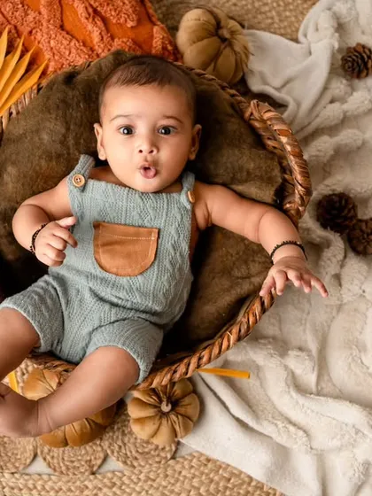 A funny and expressive "O" face from this little one. I love capturing the full range of adorable expressions during an infant session.
