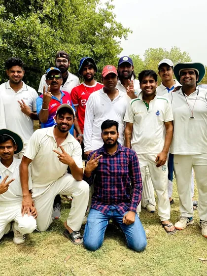 Another angle of our team's victory celebration. The smiles and gestures of triumph show the strong bond and shared sense of achievement among our players.