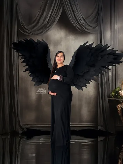 For a more dramatic and moody look, we also offer these stunning black angel wings. Paired with a simple black gown, they create a powerful and elegant statement.