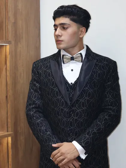 A full view of the black textured three piece suit. The fit of the waistcoat and the jacket is crucial for a clean silhouette, something I am very fussy about.
