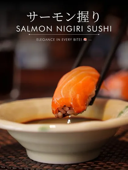 Elegance in every bite. Our Salmon Nigiri, made with fresh, melt-in-your-mouth salmon from Norway, is dipped into soy sauce, ready to be savored. It is a classic dish where freshness meets tradition.