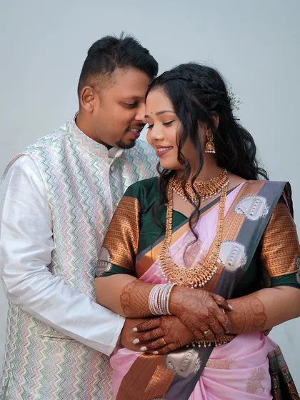 An intimate embrace between a newly engaged couple, capturing a quiet moment of connection.