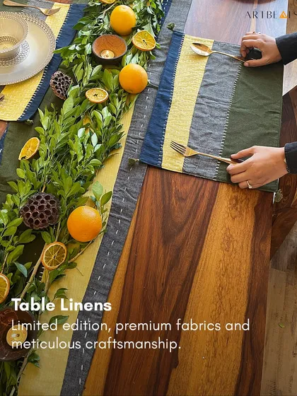 I design my table linens for people who love to host and create memories. This handcrafted table runner, made from earthy khadi linen, brings a touch of nature to your dining space. The combination of color blocking and delicate stitching makes any meal, from a festive dinner to a simple cup of tea, feel special.