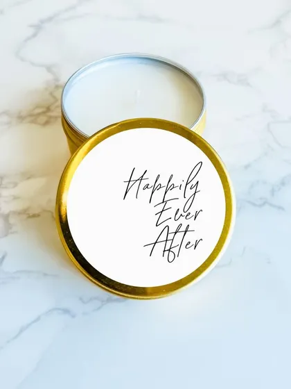 Our 'Happily Ever After' tin candle is a popular choice for wedding favors. It's a sweet and simple way to share your joy with your guests.