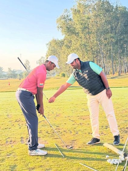 Our coaches are constantly on the range, providing hands-on instruction. From demonstrating a swing path to analyzing a student's setup, these moments of direct mentorship are where real progress is made.