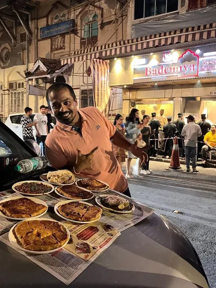 You don't need a fancy restaurant when you have a car bonnet and a feast from Bademiya. Enjoying the street food vibe with a full spread of our famous Baida Roti and other dishes.