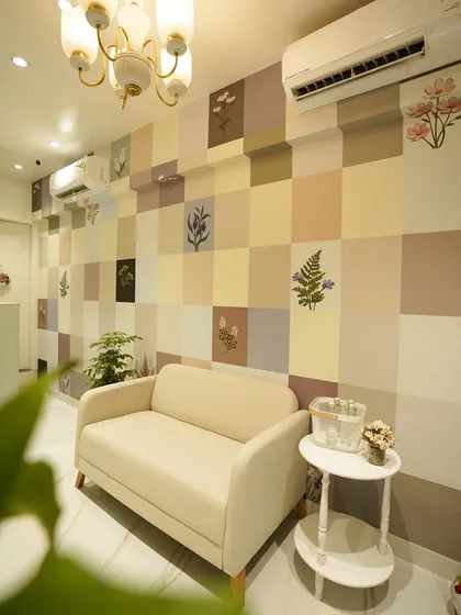 The decor in our waiting area is designed to create a tranquil atmosphere. The soft color palette and botanical details help you relax before your consultation or treatment begins.