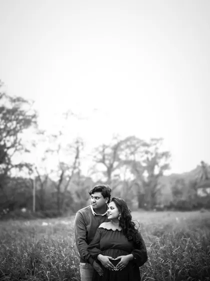 A timeless black and white portrait that strips away color to focus on the emotion and connection in a natural setting.
