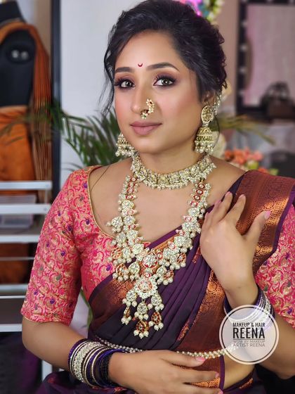 The perfect blend of tradition and glamour. The makeup is soft yet defined, letting the beautiful saree and jewellery take center stage.