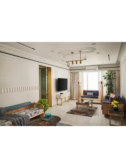 The informal living room, featuring a floor-standing swing and oak wood sofa for a blend of functionality and style.