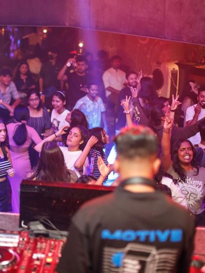 A view from behind the console of the energetic dance floor.