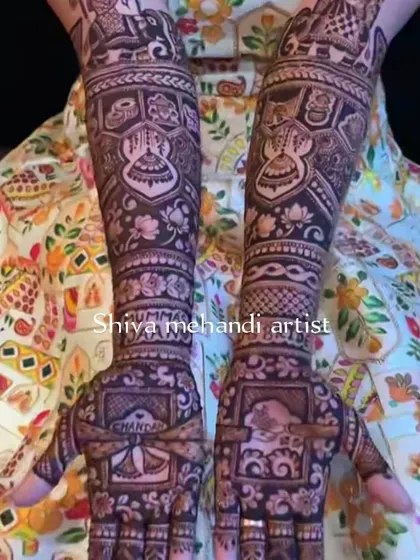A dense and intricate design featuring a variety of traditional patterns and symbols, creating a rich and full look.