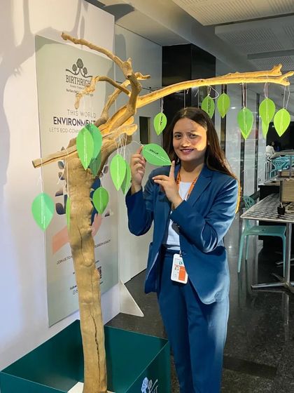 A team member hangs her pledge, showcasing the commitment that runs through our entire organization.