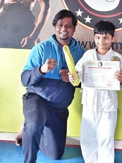 National Martial Arts and Fitness Academy - Kids Martial Arts & Fitness The Journey of Discipline: Belt Graduations photo 30