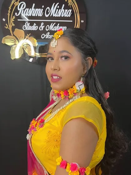 A beautiful close-up of the Haldi makeup, showing the soft eyeshadow and perfectly matched lip color.