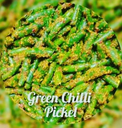 A close-up of the texture of my green chilli pickle. It's made with fresh chillies and a mix of traditional spices for that authentic desi taste.