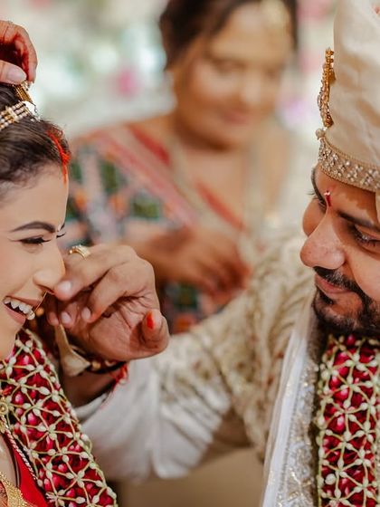 The moment the sindoor fell on her nose, leading to a shared laugh. It's these spontaneous, joyful moments during traditional rituals that make a wedding so special.