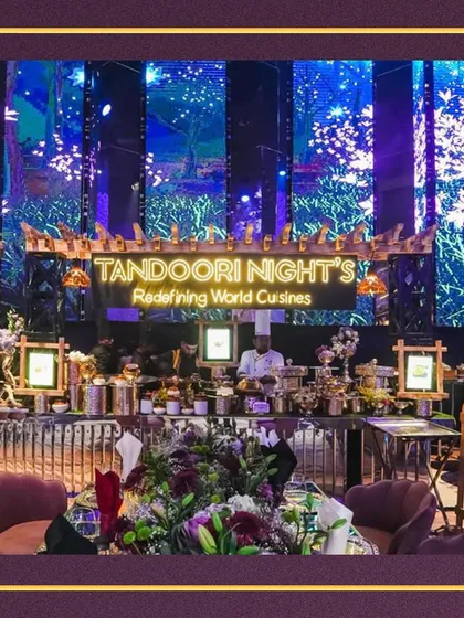 A closer look at our tempting station, where the vibrant backdrop complements the exquisite food display. We create a complete sensory experience for your guests.