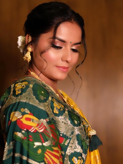 Minimal is truly magical. This soft look for a traditional ceremony proves that you don't need heavy makeup to be a stunning bride. It's all about enhancing what's already there.