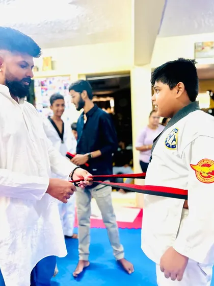 The moment a student's belt changes from red to black.