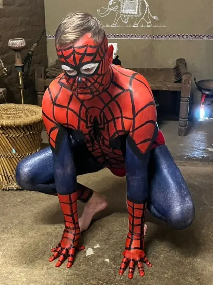 Art isn't just for canvas. Here's a look at a full-body painting project, transforming a client into Spiderman. This showcases the unique and specialized creative services we offer for projects and events.