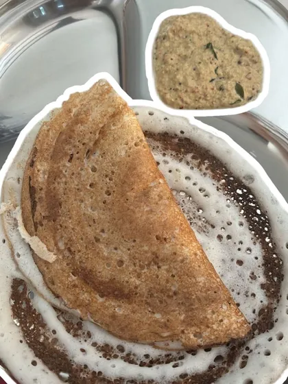 A simple, homemade dosa with chutney is a perfect example of a healthy, gut-friendly meal that's part of a sustainable diet.