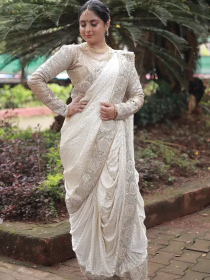 Nothing says 'मराठमोळं' like a classic Nauvari saree. This elegant white pre-stitched Nauvari is surprisingly easy to wear and perfect for weddings, pujas, or any traditional Maharashtrian function.