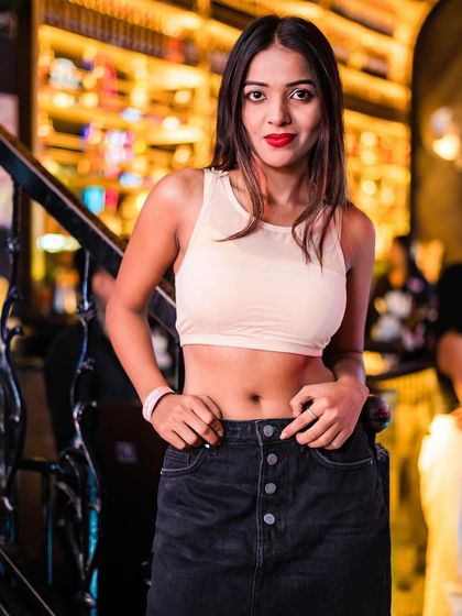 A guest posing on the stairs.