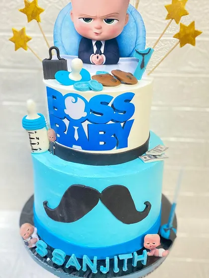 Who's the boss? This two-tier butterscotch Boss Baby cake is one of our most popular first birthday themes. We love creating detailed, fun-filled cakes for your little one's big milestones.