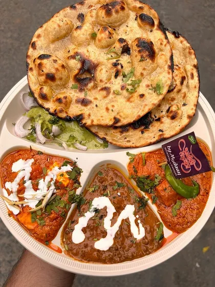 A complete meal for one, our Pyaar Wali Thali comes with Dal Makhni, a paneer preparation, and another vegetable dish, served with freshly made naans.