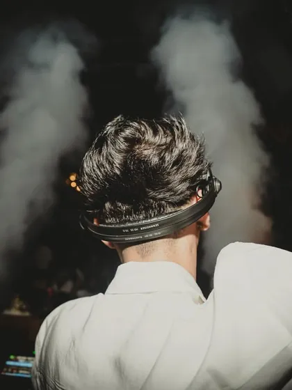 A dramatic shot from behind, with CO2 smoke creating a powerful silhouette. This highlights the theatrical elements I bring to my performances.