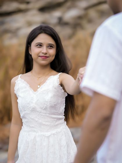 A duplicate of a classic 'follow me to' style shot, emphasizing the romantic gesture.