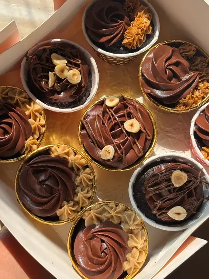 A box of our 85-calorie cupcakes offers all the flavor with none of the regret. You can choose up to 3 flavors in a box of 9, including Dark Chocolate, Noir Nutella, and Cookie Butter.