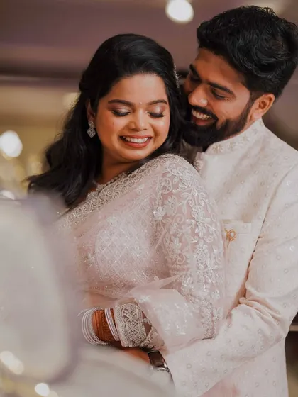 Another angle of this gorgeous couple. The bride's makeup is flawless from every view, with a focus on radiant skin and softly defined eyes.