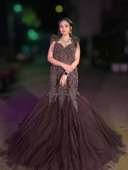 Another full-length shot of this stunning brown gown, perfect for a high-fashion portfolio.