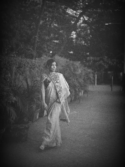 A wider shot from the vintage series, placing the subject in an old-world setting to enhance the feeling of a bygone era.