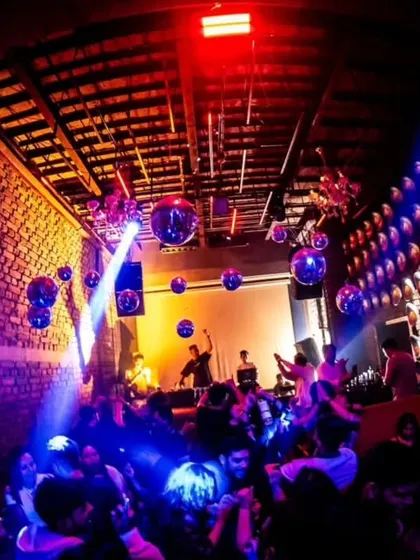 The unique decor of Roxy, with its wall of reflective spheres, creates an amazing visual effect when combined with the club's lighting.