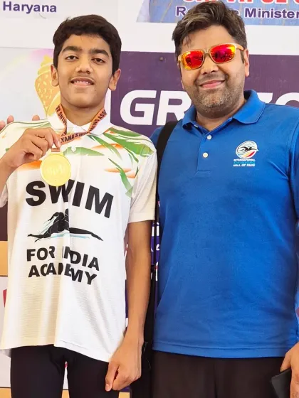 A proud coach moment with Aarez Asif after he won gold in the 100m Backstroke with a new personal best time at the Haryana State Junior competition.