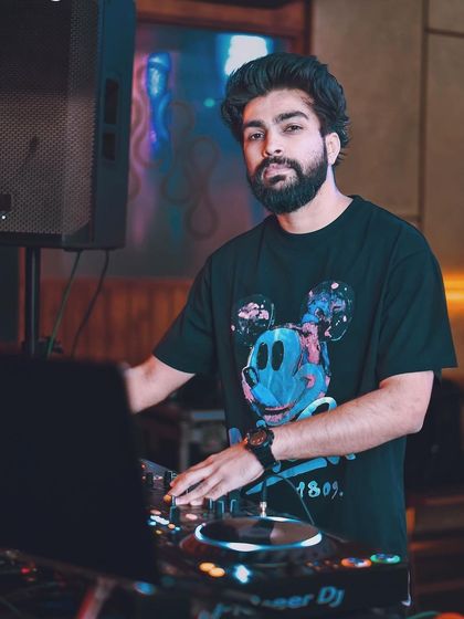 A recap shot from a night at The Fixx Bar, showing me at the decks and ready for the next party.