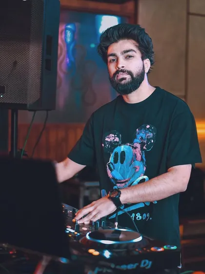 A recap shot from a night at The Fixx Bar, showing me at the decks and ready for the next party.
