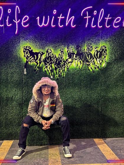 A shot from Filter cafe, in front of a neon sign of running horses. This captures my philosophy of focusing and aiming for something great, even when life pulls you back.