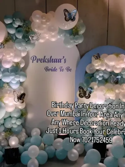 For a modern bridal shower, I designed this elegant backdrop using a cool palette of pastel blue, white, and silver balloons. The personalized "Bride to Be" sign and delicate butterfly details add a unique touch.